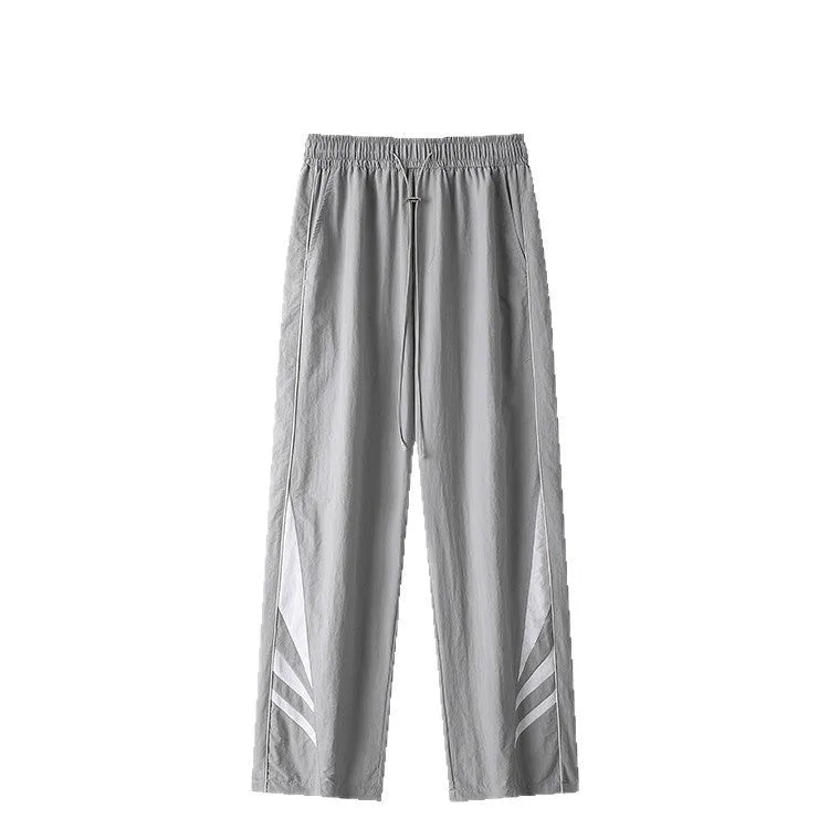 Men's straight-leg casual trousers in grey colour with elastic waistband and button fly