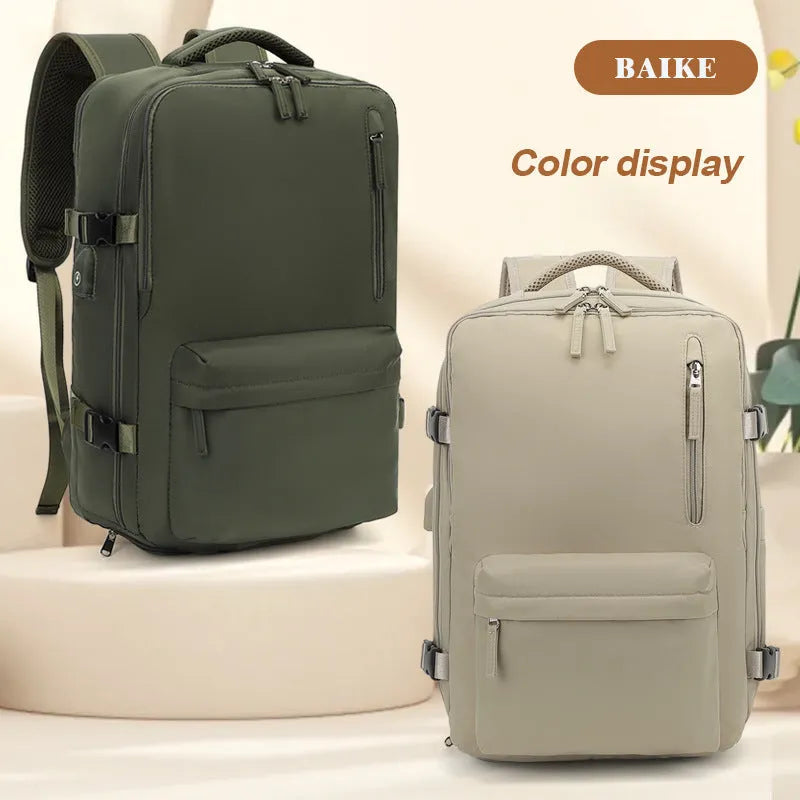 Large grey lightweight Oxford cloth travel backpack with curved shoulder straps shown from the side.