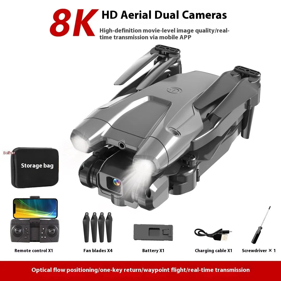 S138 black carbon fibre folding drone with propellers extended, showing dual camera and obstacle avoidance sensors.