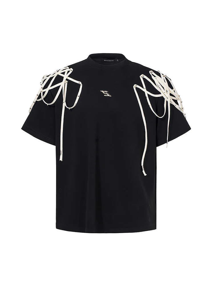 Black loose fit T-shirt with padded shoulders and decorative rivet ribbon detail on a short sleeve.