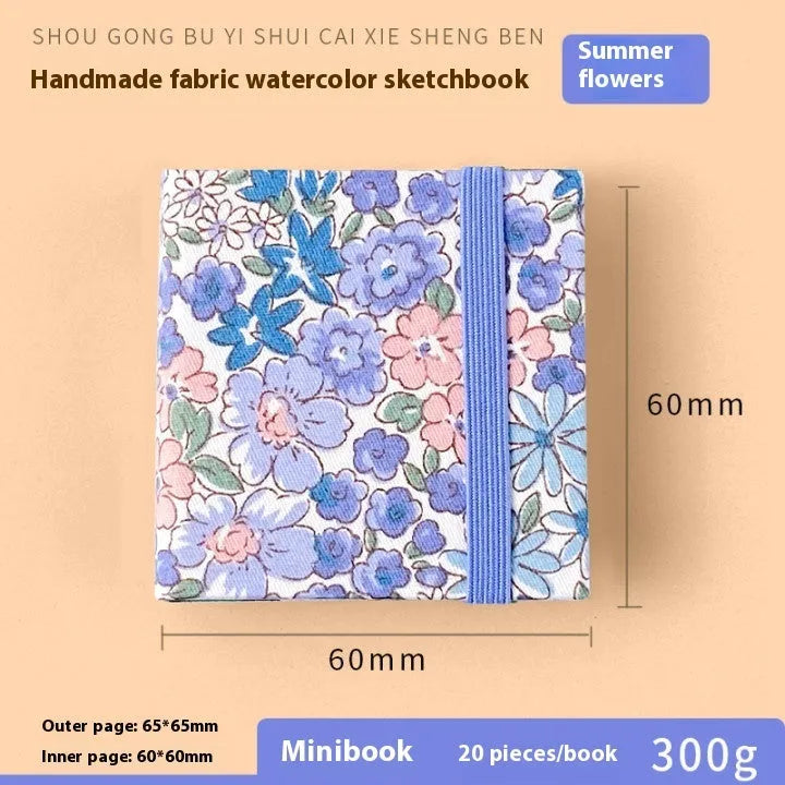 Feiluniao handmade fabric watercolour sketchbook with colourful themed cover, 185mm long.