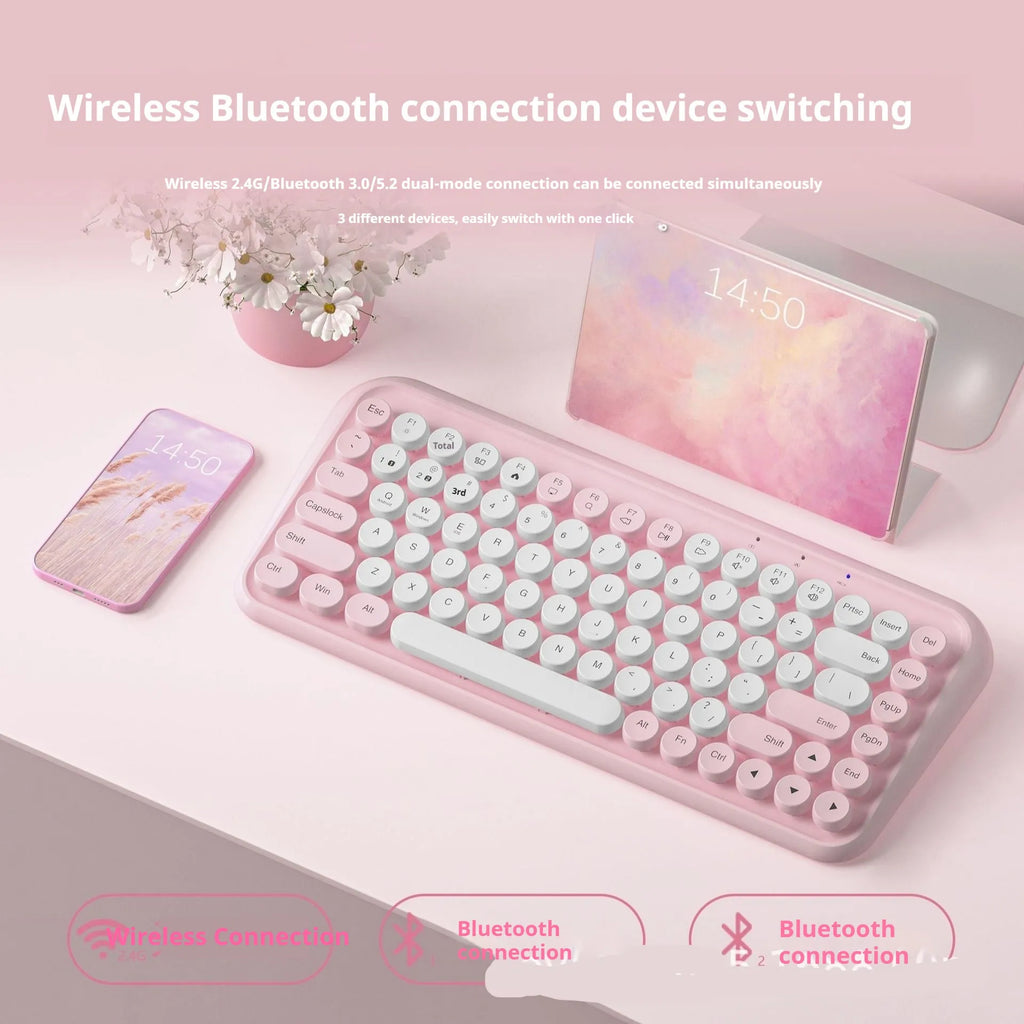 Pink wireless Bluetooth mechanical keyboard with 84 keys and compact portable design