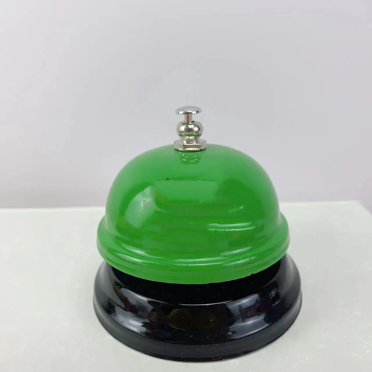 Iron game bell in various colours for classroom and restaurant use
