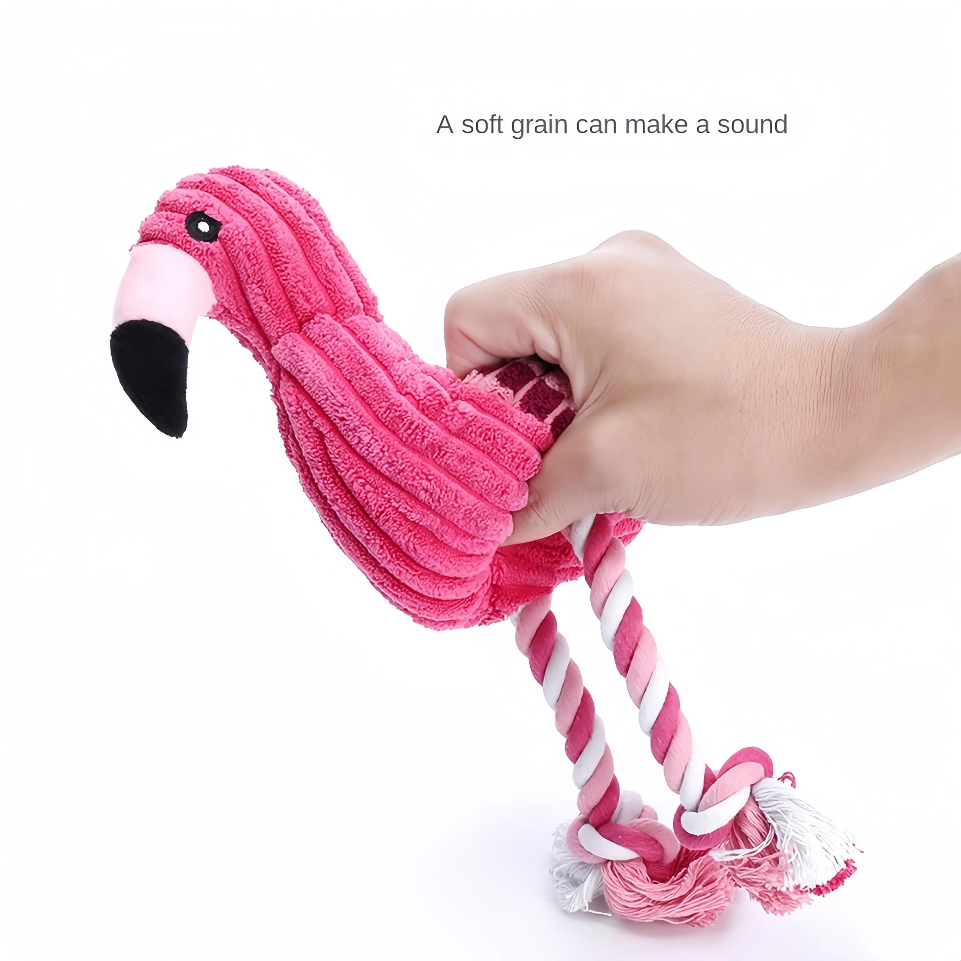 Pink animal-shaped plush dog toy with corduroy fabric and internal squeaker for small and large breed dogs