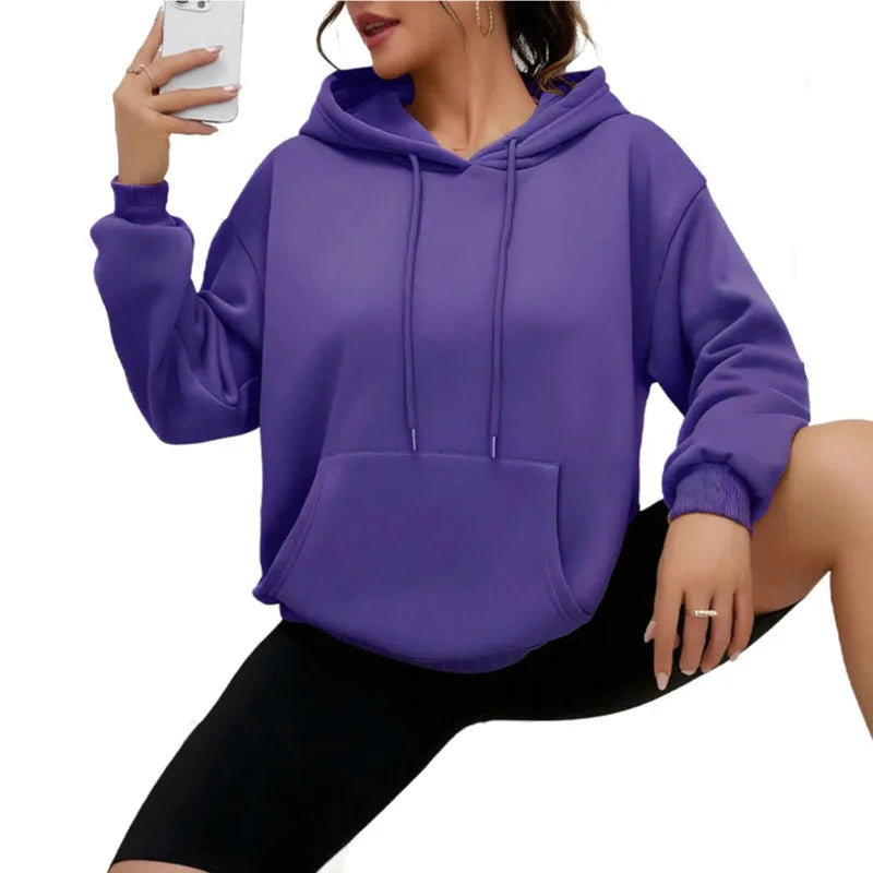 Women's loose fit grey sweatshirt with drawstring hood and kangaroo pocket