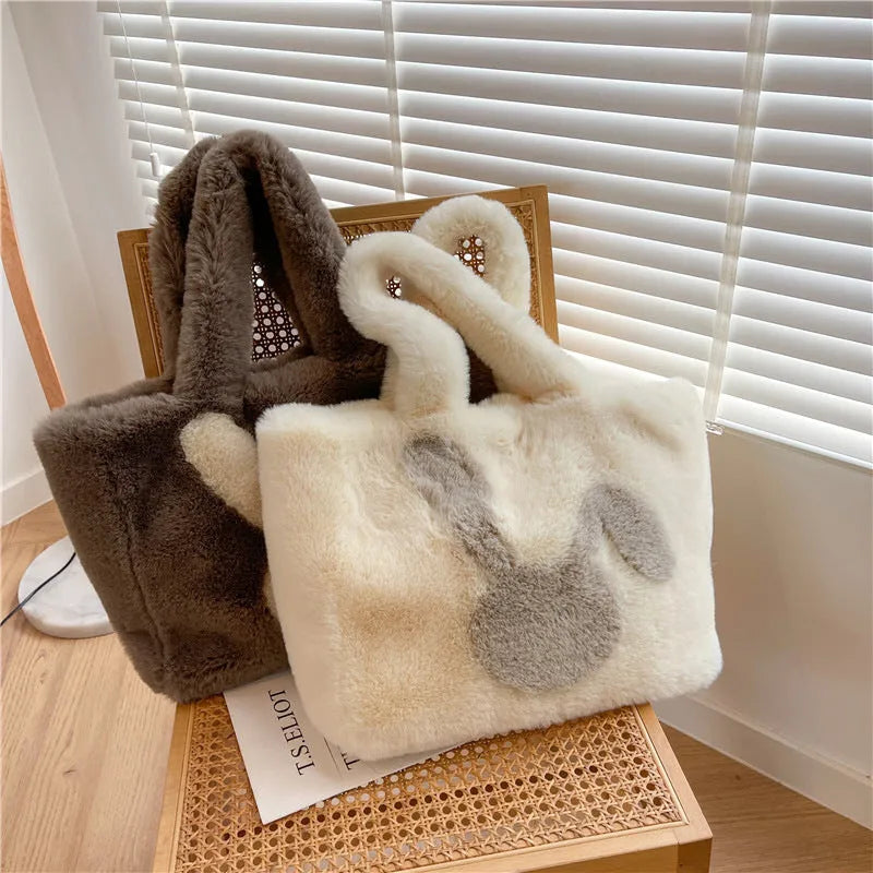 Plush shoulder bag with cartoon rabbit ears detail in solid colour