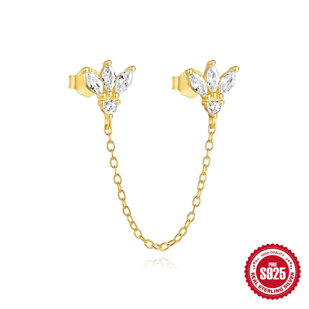 S925 sterling silver stud earrings with zircon inlay in golden geometric designs including clover and crown.
