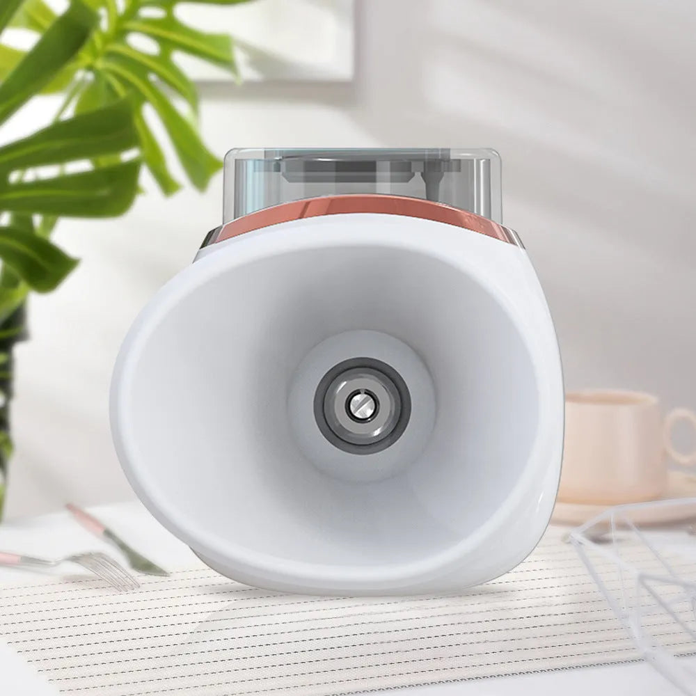 Purple and white household eye humidifier with charging cable on white background