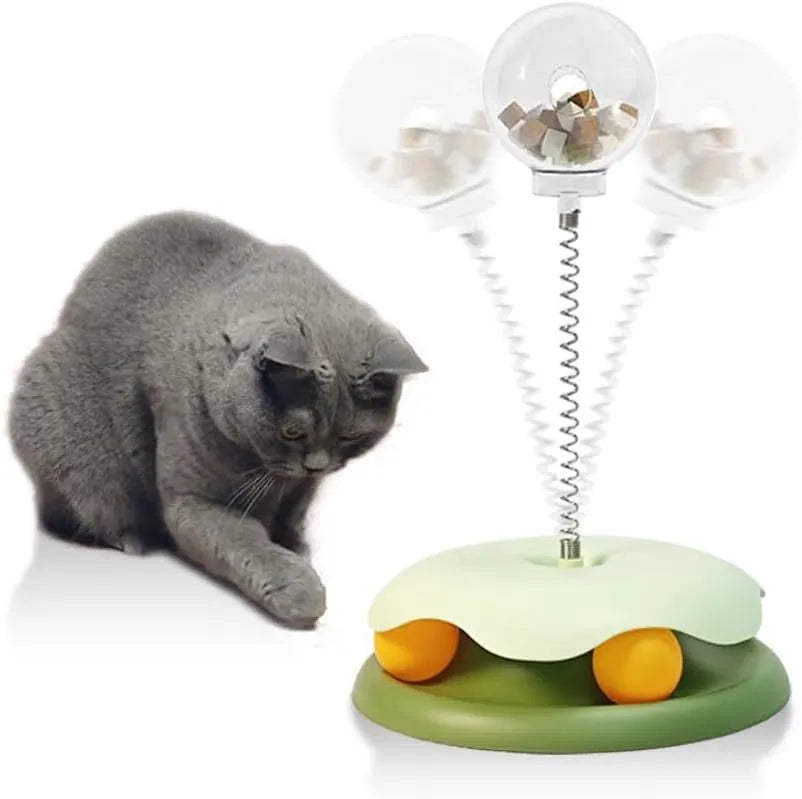 Blue cat treat dispenser toy with track ball design for slow feeding and entertainment