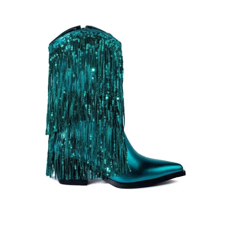 Women's black chunky heel tassel boots with pointed toe and super high stiletto heel on a plain background.