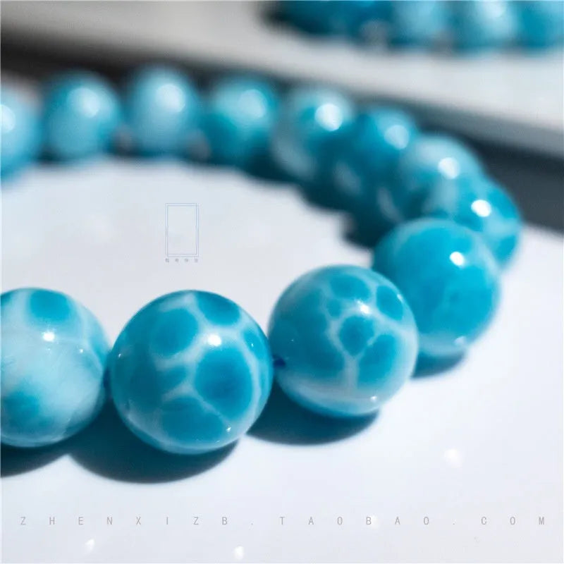 Blue bodhi bracelet with natural sea-pattern crystals and pearl accents in Maillard style