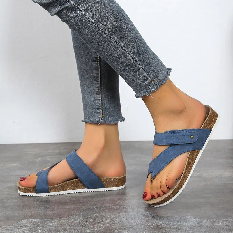 Flat toe ring thick-soled flip-flops in a solid colour on a foam sole.