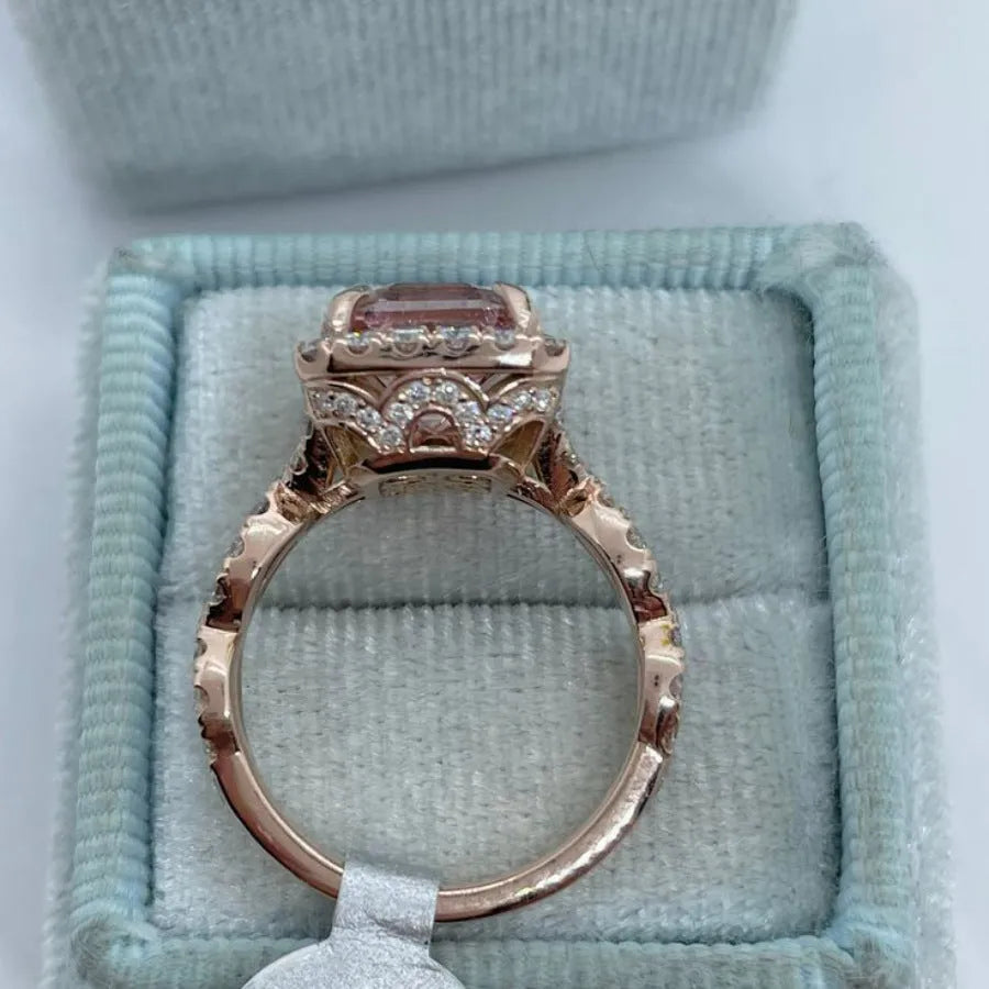 Geometric rose gold alloy ring showing straight edges and angular design