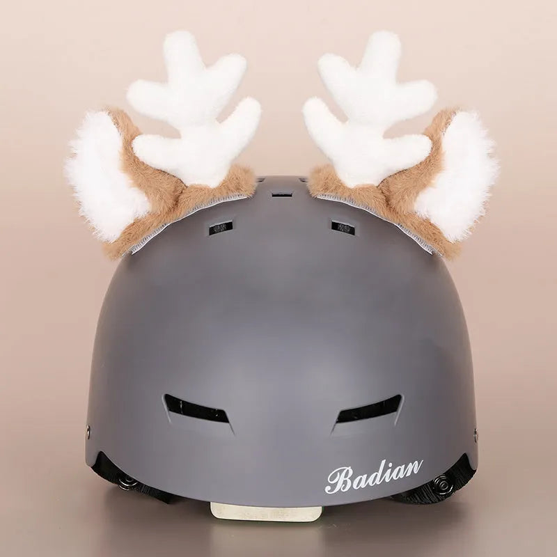 A plush fabric cartoon character helmet hat cover with attached ears on a white background.