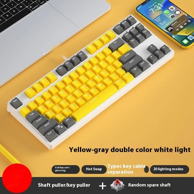 87-key wired mechanical gaming keyboard with hot-swappable switches shown in a two-tone colour scheme on a metal chassis.