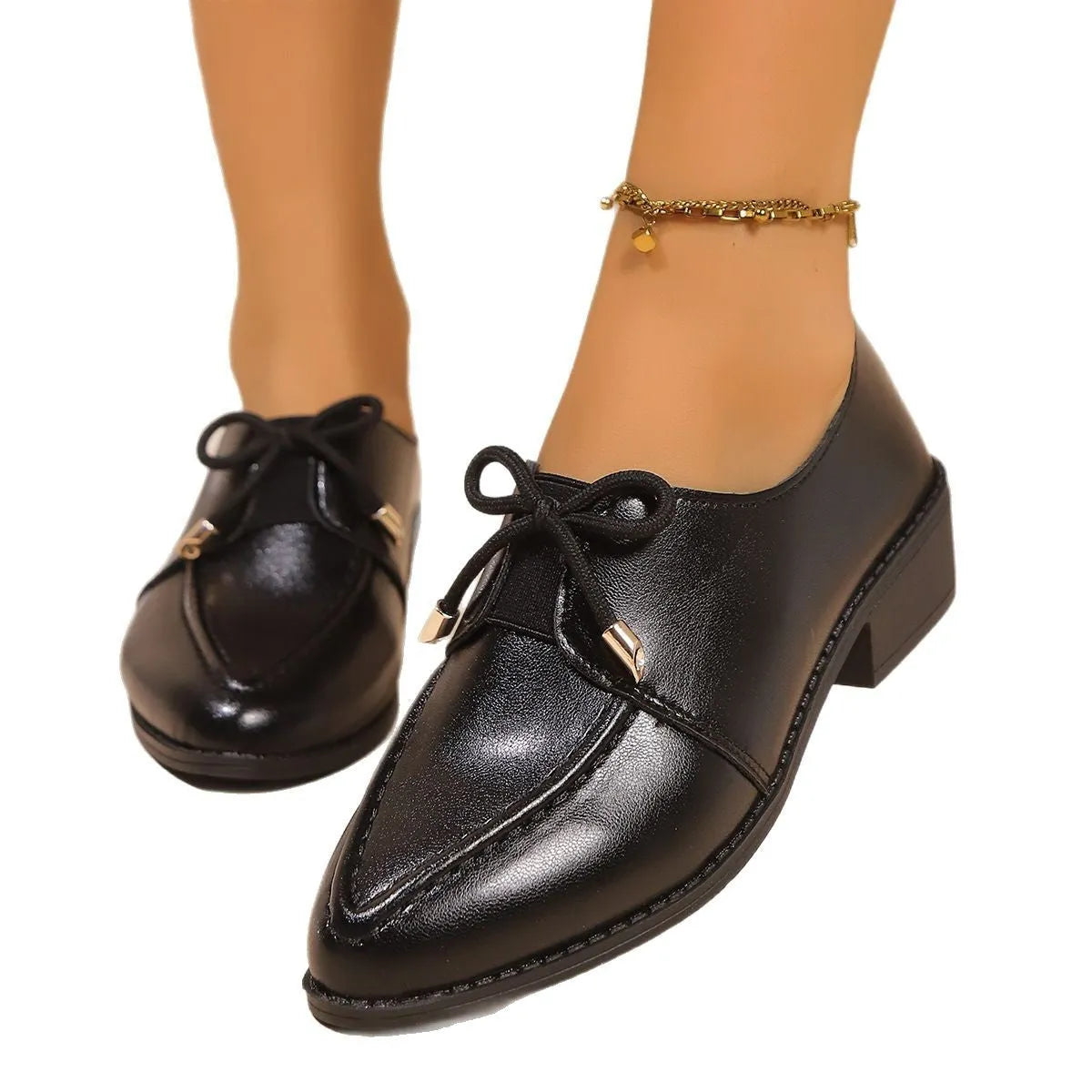 Women's leather-style shoes with bow decoration on PU upper and rubber sole