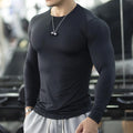 Men's black slim-fit long sleeve fitness tights for running and gym workouts