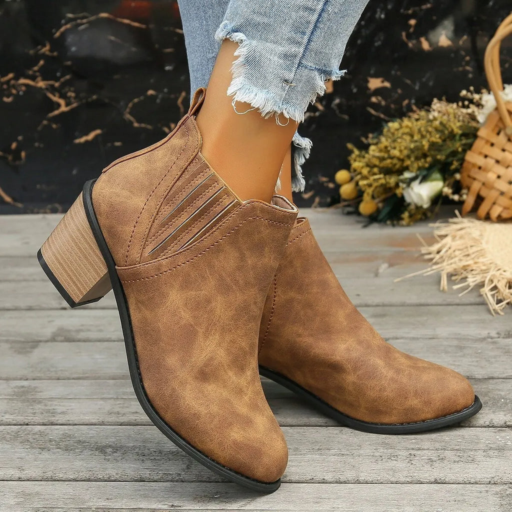 Women's black ankle boots with pointed toe and thick square slip-on heel