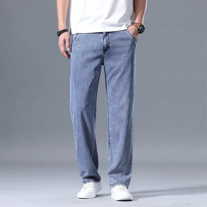 Men's loose straight-leg lyocell jeans in light blue with zipper fly closure