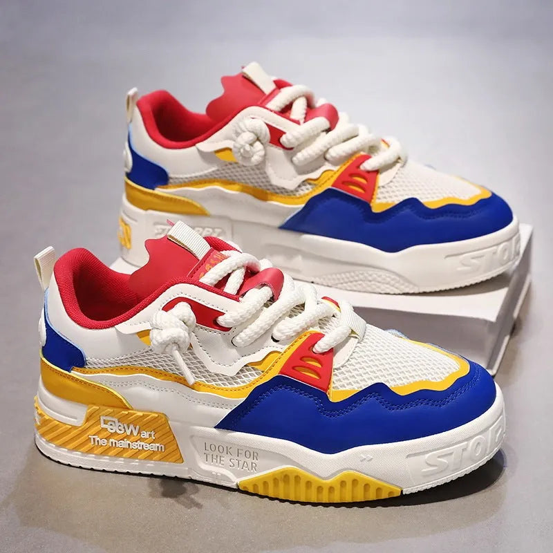 Men's low-top canvas board shoes in a colour-matched pattern with a flat rubber sole.