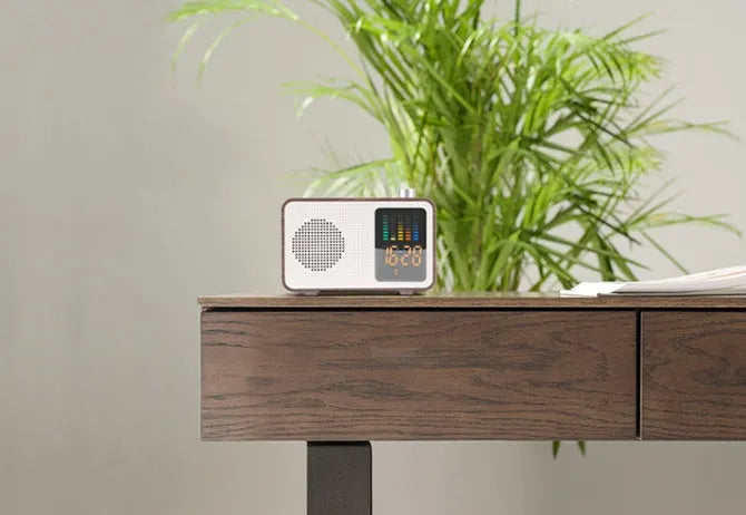 Brown retro radio bluetooth speaker with tuning knob and classic control panel for wireless streaming and radio listening