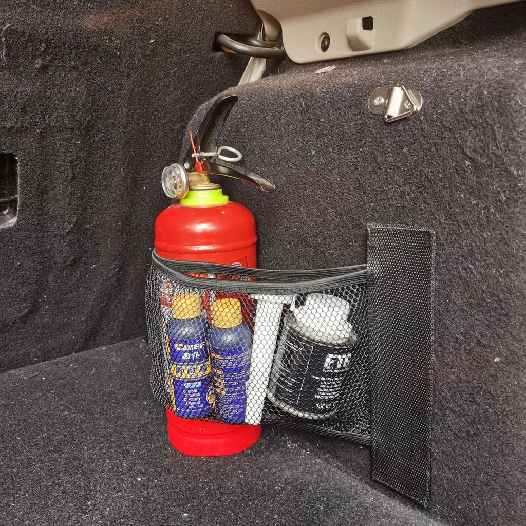 Elasticated polyester car boot storage net shown holding shopping bags, available in 20x35cm and 20x45cm sizes.