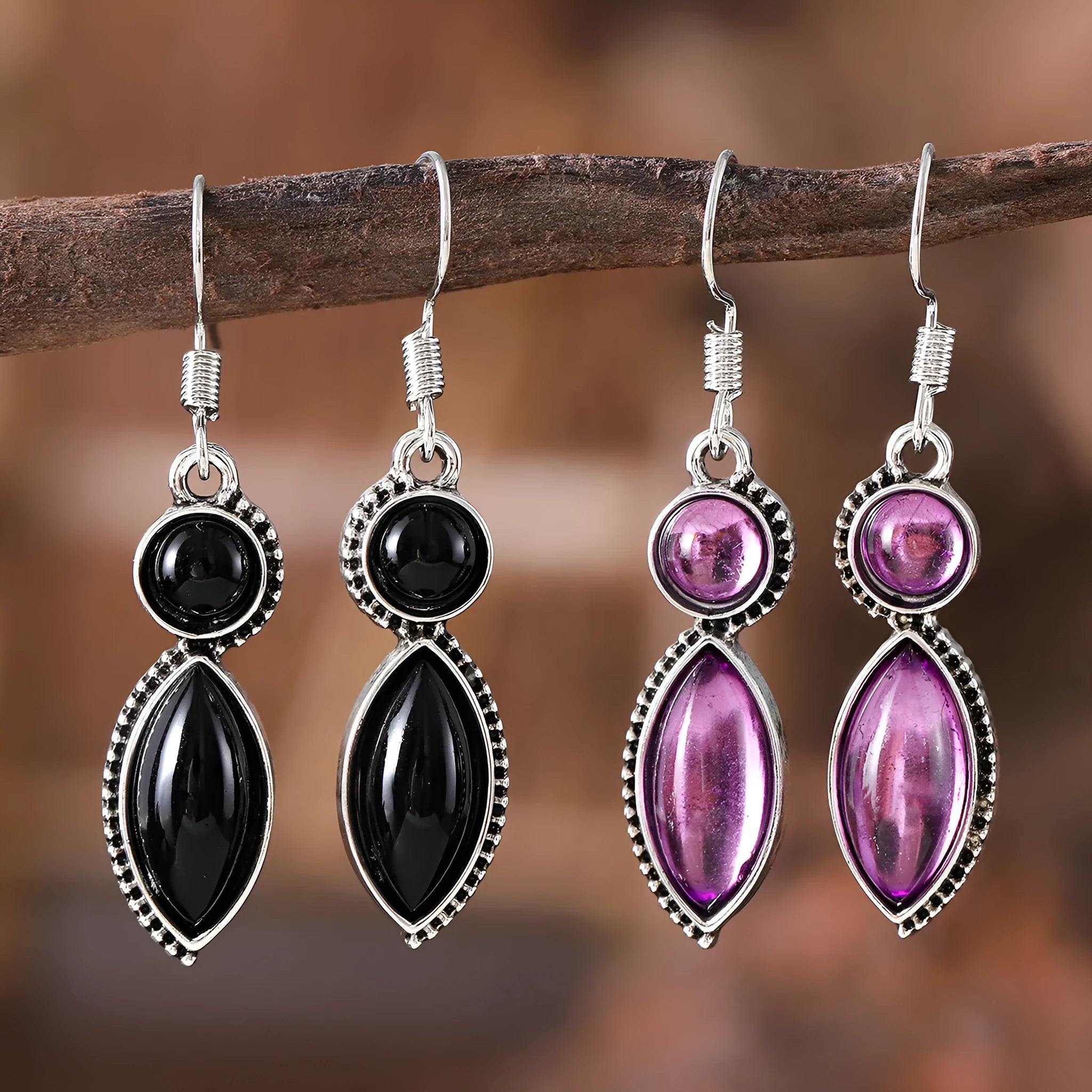 A pair of black and purple geometric vintage pendant earrings with a round detail, made from zinc alloy.