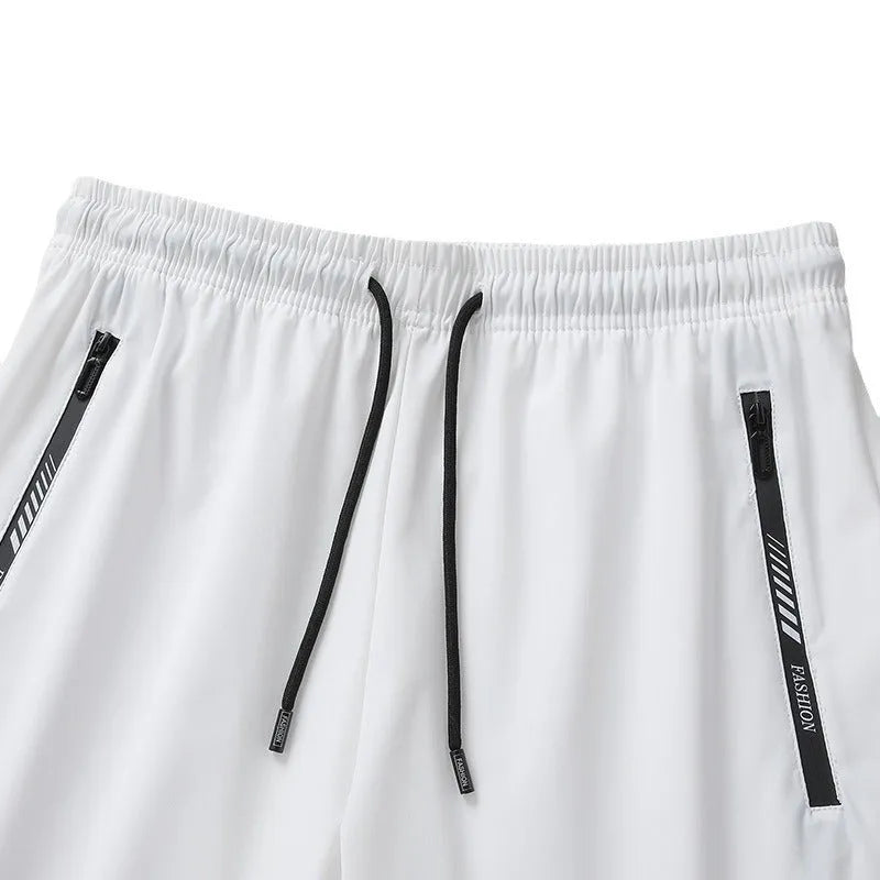 Men's black quick-dry loose fit sports shorts with elastic waistband on size chart