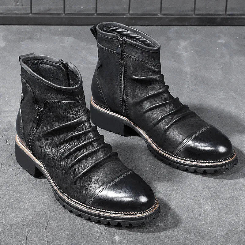 Black and brown mid-calf cowboy boots with a side zipper, round toe, and horseshoe heel