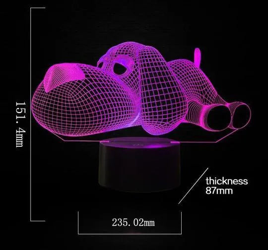 3D illusion dog lamp glowing with multi-colour light on a desk base