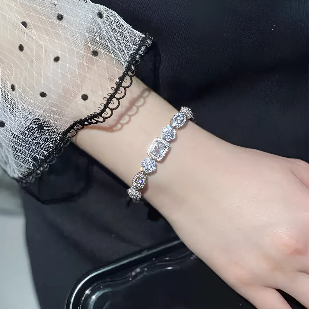 Women's sterling silver-plated bracelet with zircon stones in geometry design, shown in two size options