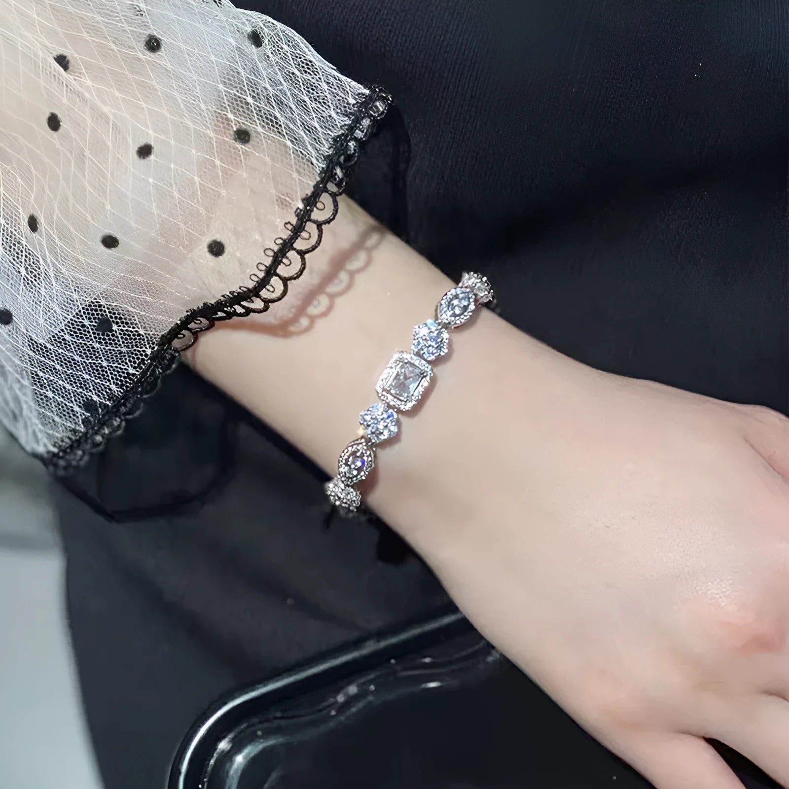 Women's sterling silver-plated bracelet with zircon stones in geometry design, shown in two size options