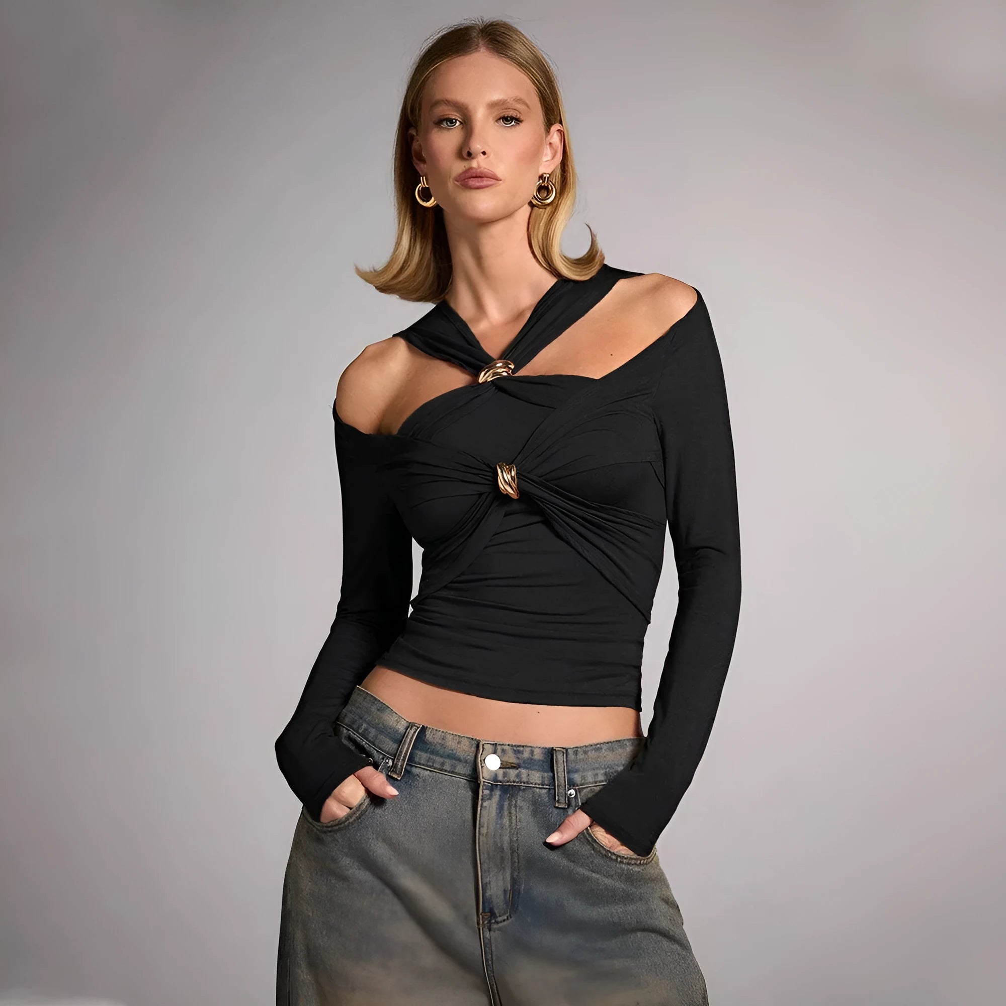 Black women's halter neck long sleeve slim fit top on a hanger.
