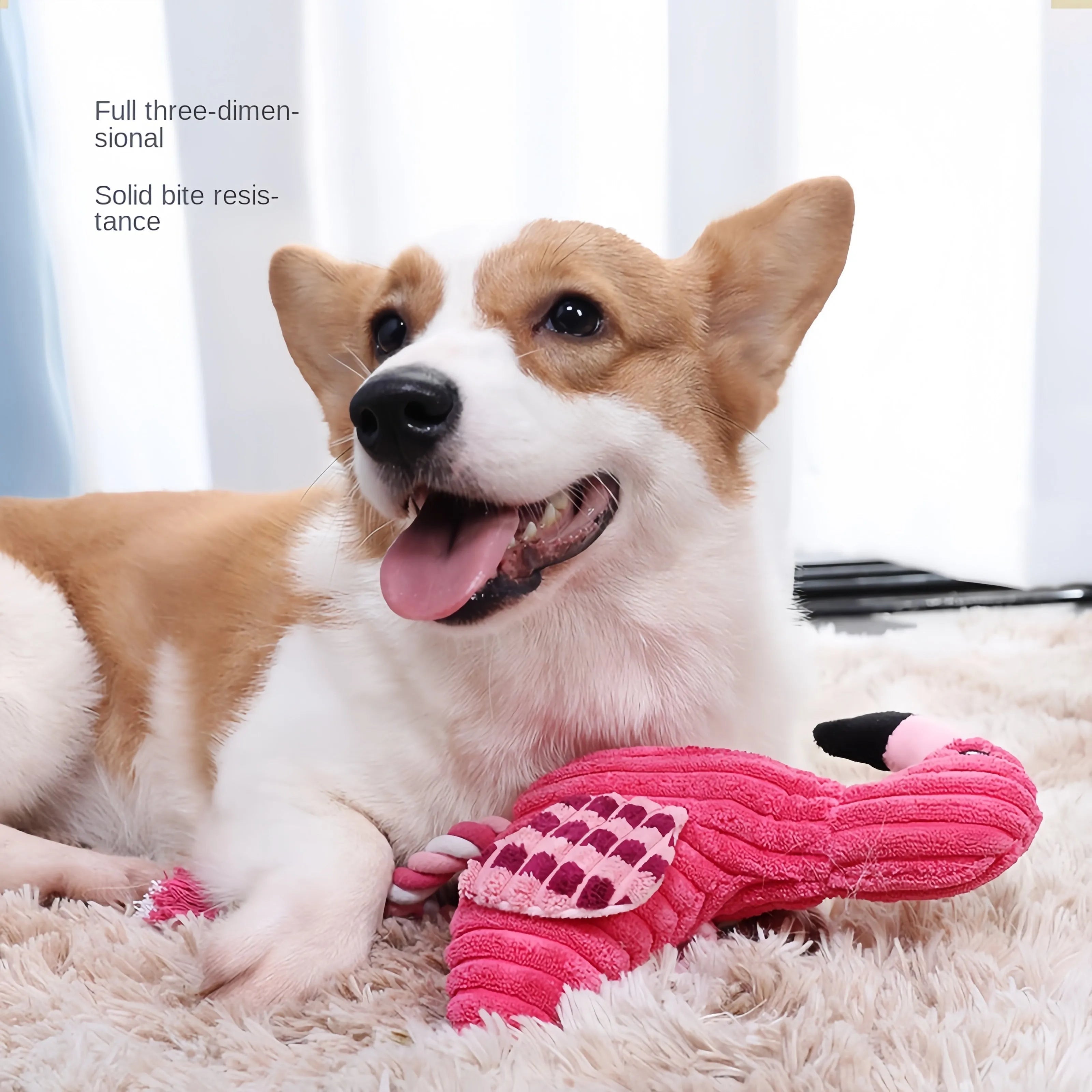 Pink animal-shaped plush dog toy with corduroy fabric and internal squeaker for small and large breed dogs