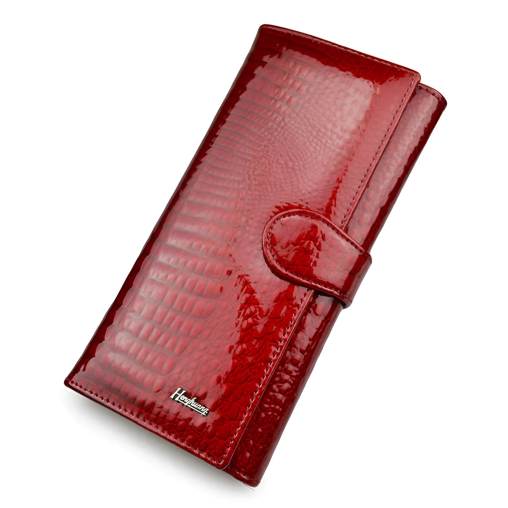 Women's patent leather coin purse with crocodile pattern texture in red colour