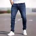Men's slim fit dark blue jeans with skinny leg design and mid waist cut