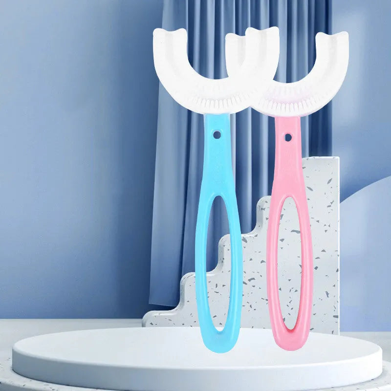 Children's U-shaped soft rubber toothbrush in pink and blue colours for milk teeth cleaning