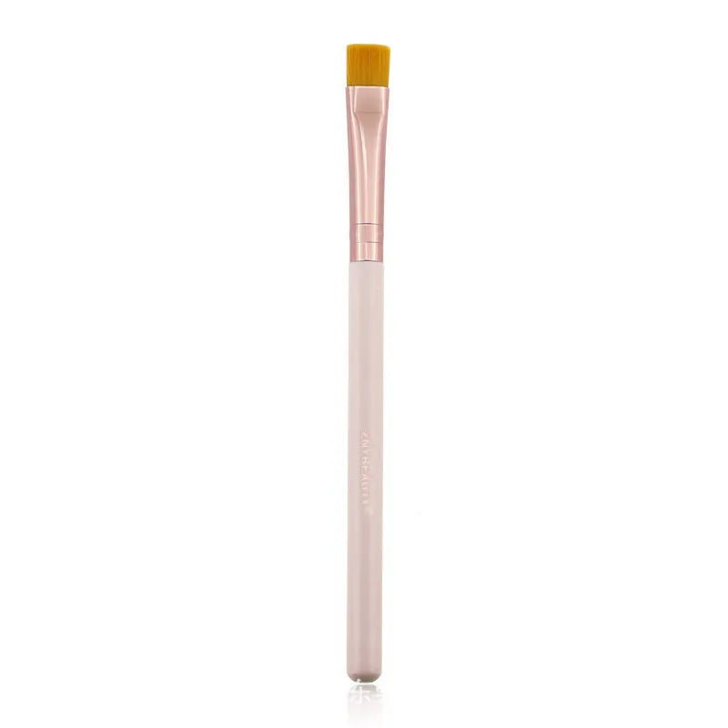 26 pink-handled makeup brushes with wool bristles in a rolled-up PU case