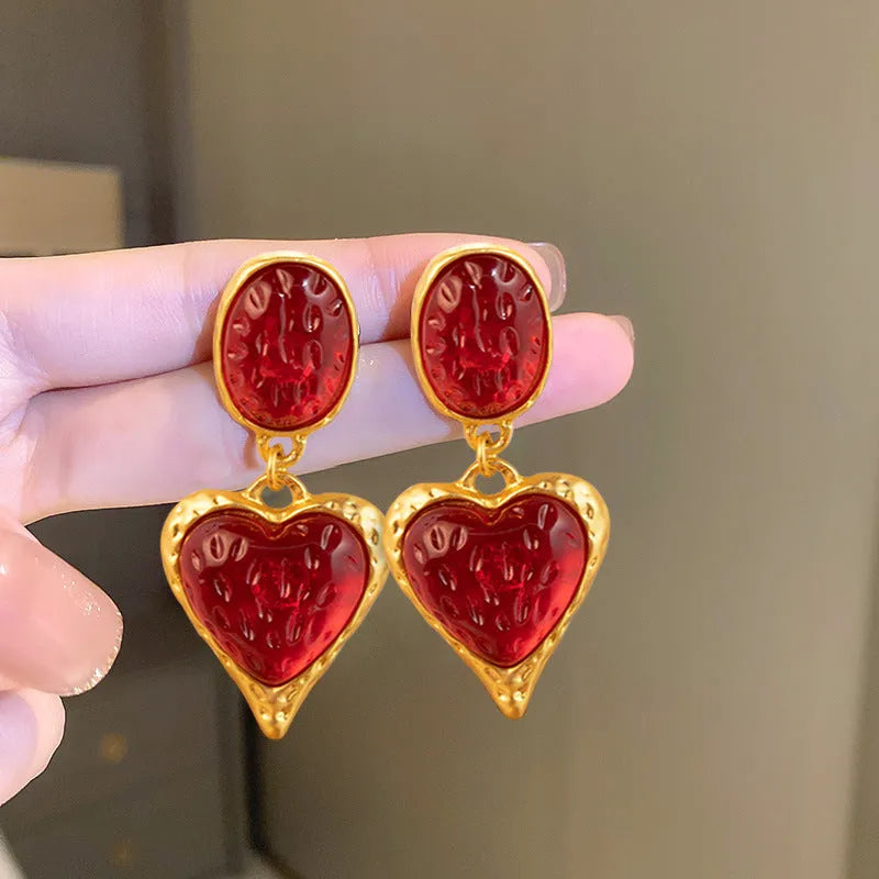 Silver needle pleated oval love heart stud earrings in alloy, showing green, purple, red, and yellow and white colour options.