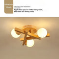 Nordic wooden style ceiling light fixture with three neutral white light heads