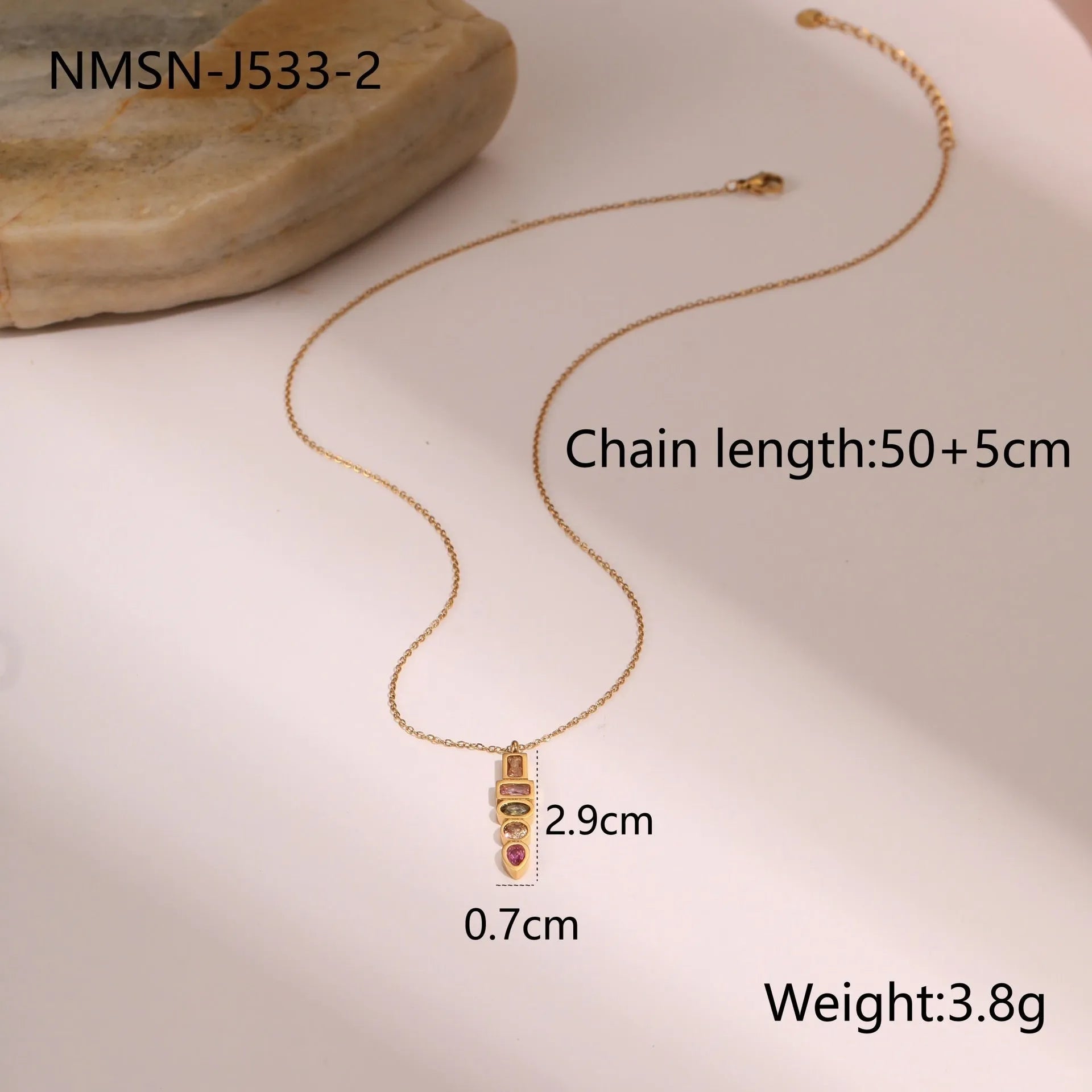 Geometric gold plated jewellery set with necklace, ring, and earrings on stainless steel chain