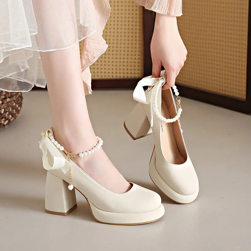 Women's beige Mary Jane shoes with chunky heels and ankle-strap buckle fastening, round toe shape