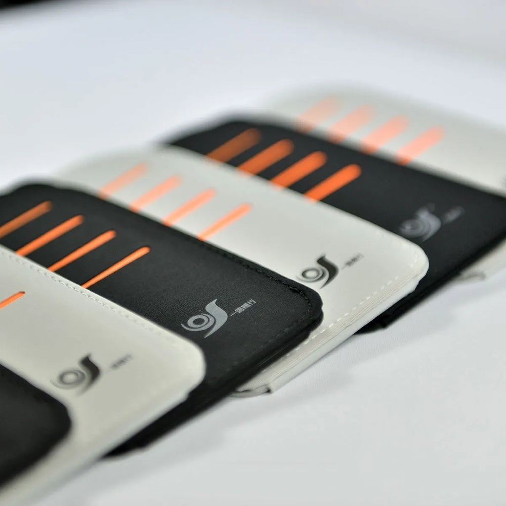 Set of four foldable car sun visors and a storage bag for dashboard and windscreen protection.