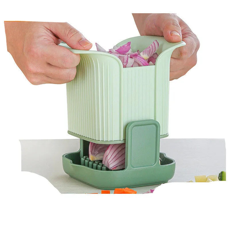 Green multifunctional vegetable chopper with hand pressure mechanism and stainless steel blade for slicing onions and potatoes