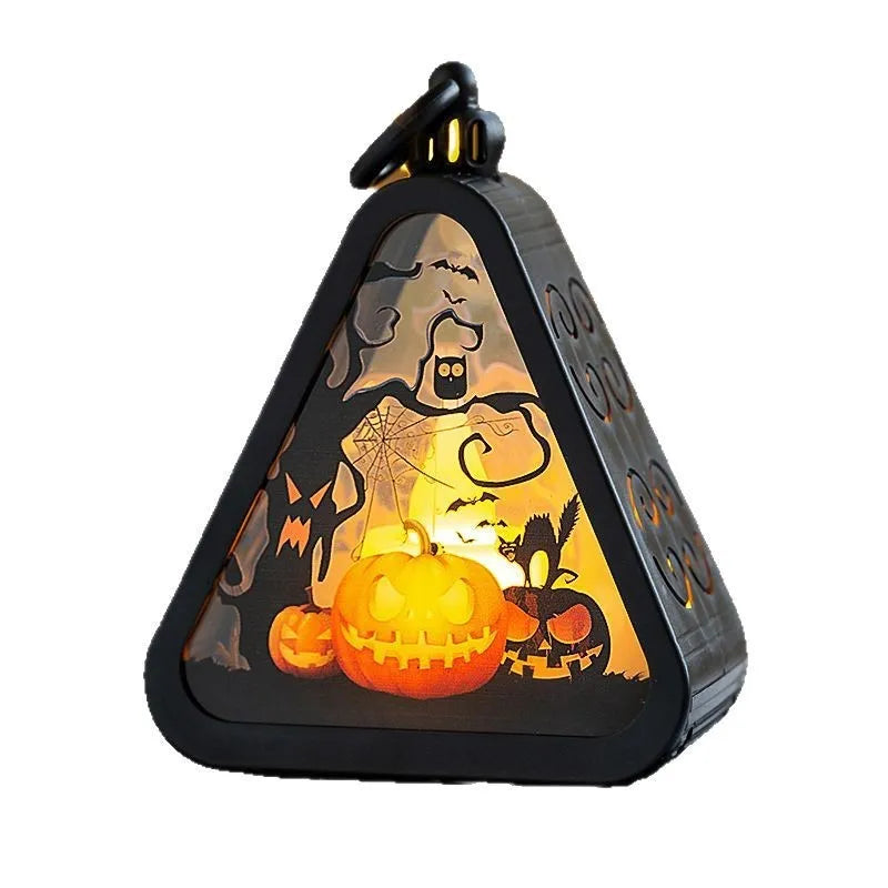 Portable Halloween pumpkin lamp decoration in plastic and glass with four colour theme options