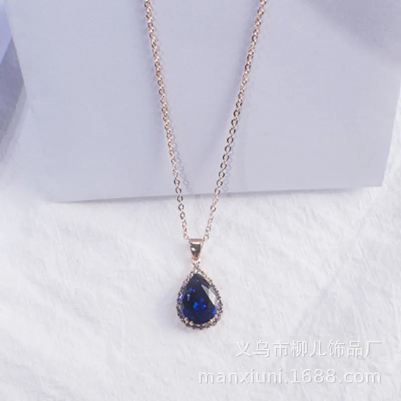 Drop shape geometric pendant necklace with rhinestone inlay in pink rose gold electroplated finish