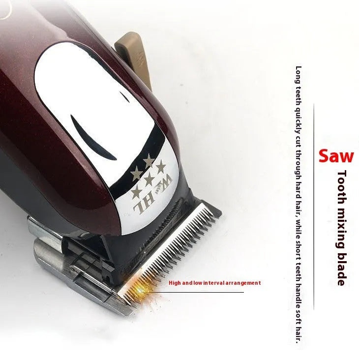 Cordless charging hair clipper set with stainless steel cutter head on a table.