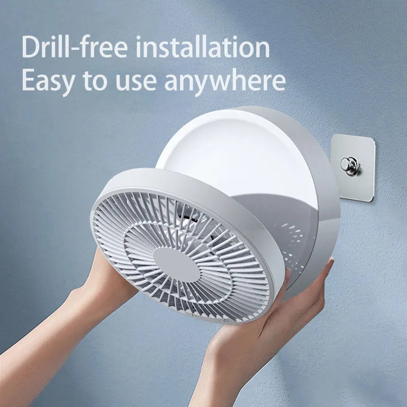 White USB rechargeable folding fan with remote control on a desk, showing 90° adjustable head and night light