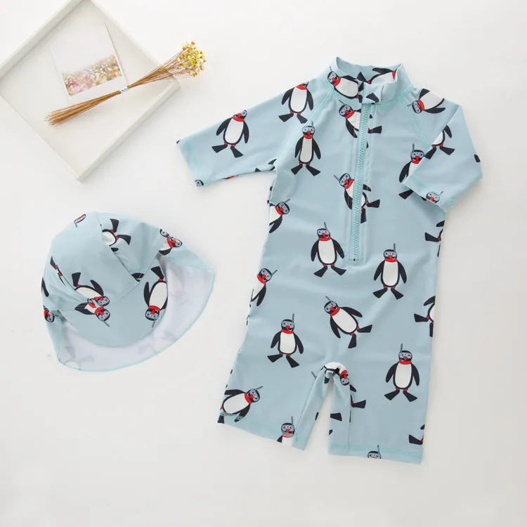 Boys' penguin pattern swimsuit set with long sleeves and matching swimming cap