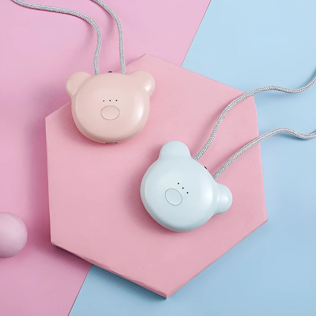 Mini USB air purifier necklace in pink showing compact wearable design with one-button control